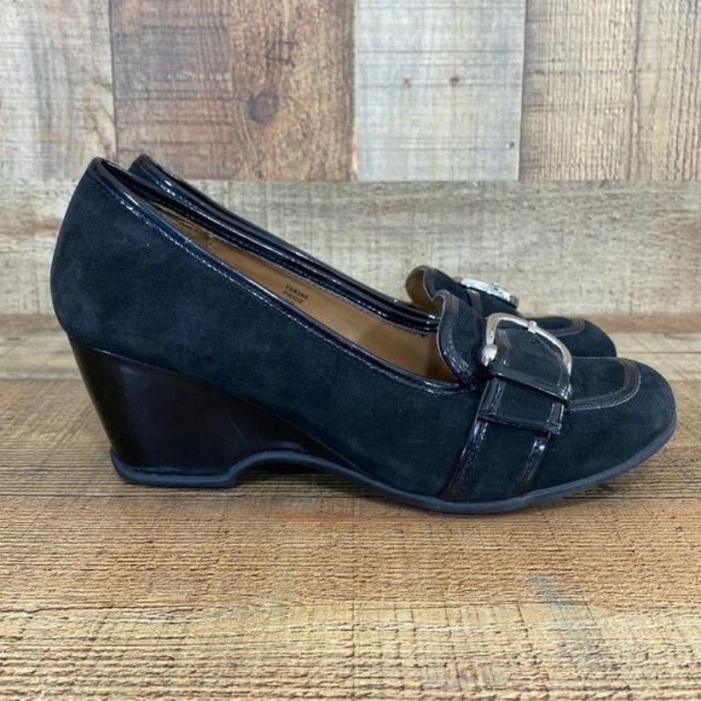 3/$12

Sophisticated Black Wedge Loafers with Silver Buckle. Buy 2 more for $12!